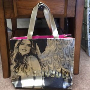 Victoria’s Secret SUPERMODEL embossed angel tote.